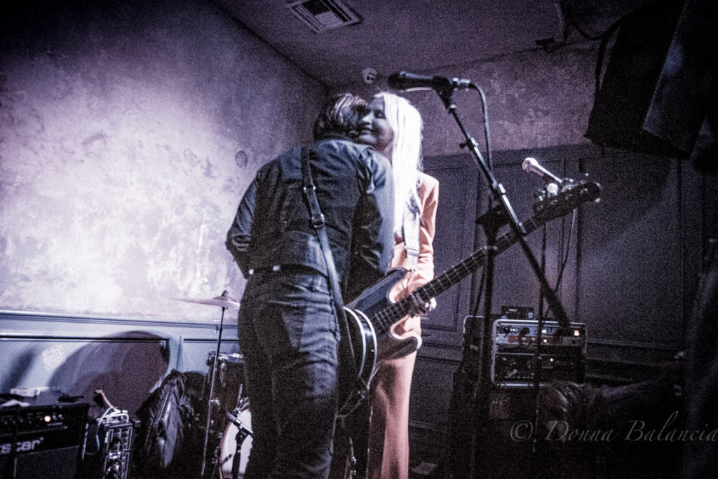 Jesse Hughes and Jennie Vee: Two Eagles of Death Metal huddle - Photo Donna Balancia