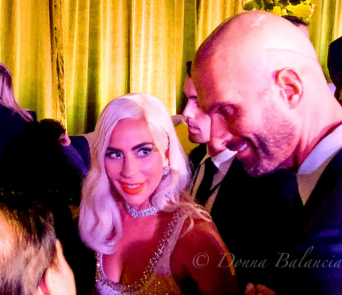 Lady Gaga shares a laugh with friends at the premiere of 'A Star Is Born' - Photo © 2018 Donna Balancia