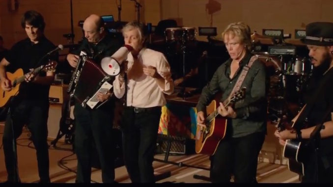 Paul McCartney uses megaphone to sing to his wife Nancy - Youtube photo