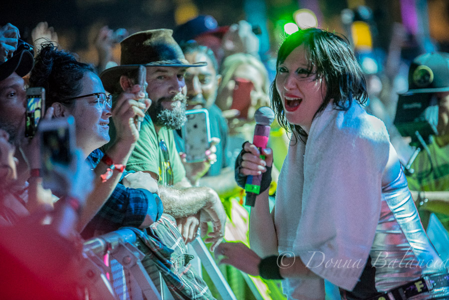 Karen O goes up to the rail and offers people a chance to sing - Photo © 2018 Donna Balancia