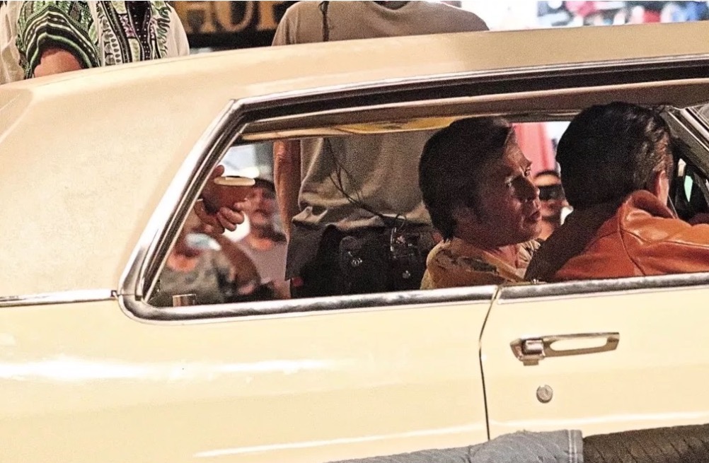 Brad Pitt and Leonardo DiCaprio in 'Once' - Photo by Alyson Camus