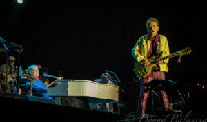 Blondie Chaplin jams as Brian Wilson looks on at BeachLife Fest - Photo © Donna Balancia