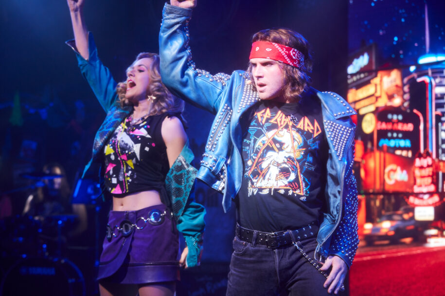 Sherrie (Callandra Olivia) and Drew (Ian Ward) Rock in Rock of Ages Hollywood