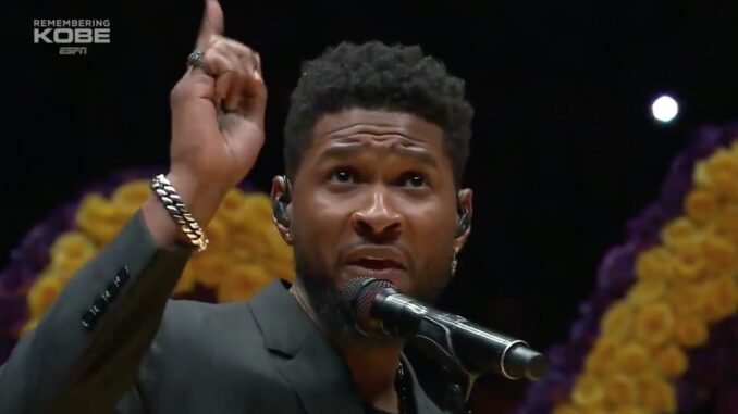 Usher at Laker Game - Courtesy ESPN