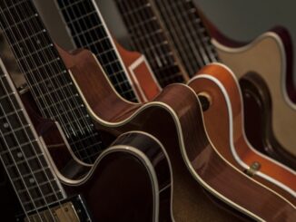How to Choose Between an Acoustic and Electric Guitar - Courtesy