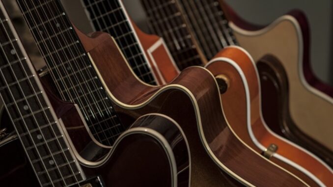 How to Choose Between an Acoustic and Electric Guitar - Courtesy