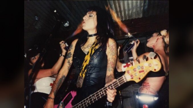 Bianca on stage with original Torch Girls Carol and Winter. 10/2/98 The Garage - Ames Flames photo for US Rocker
